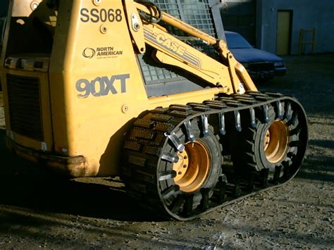 track or tires skid steer|bobcat rubber tracks over tires.